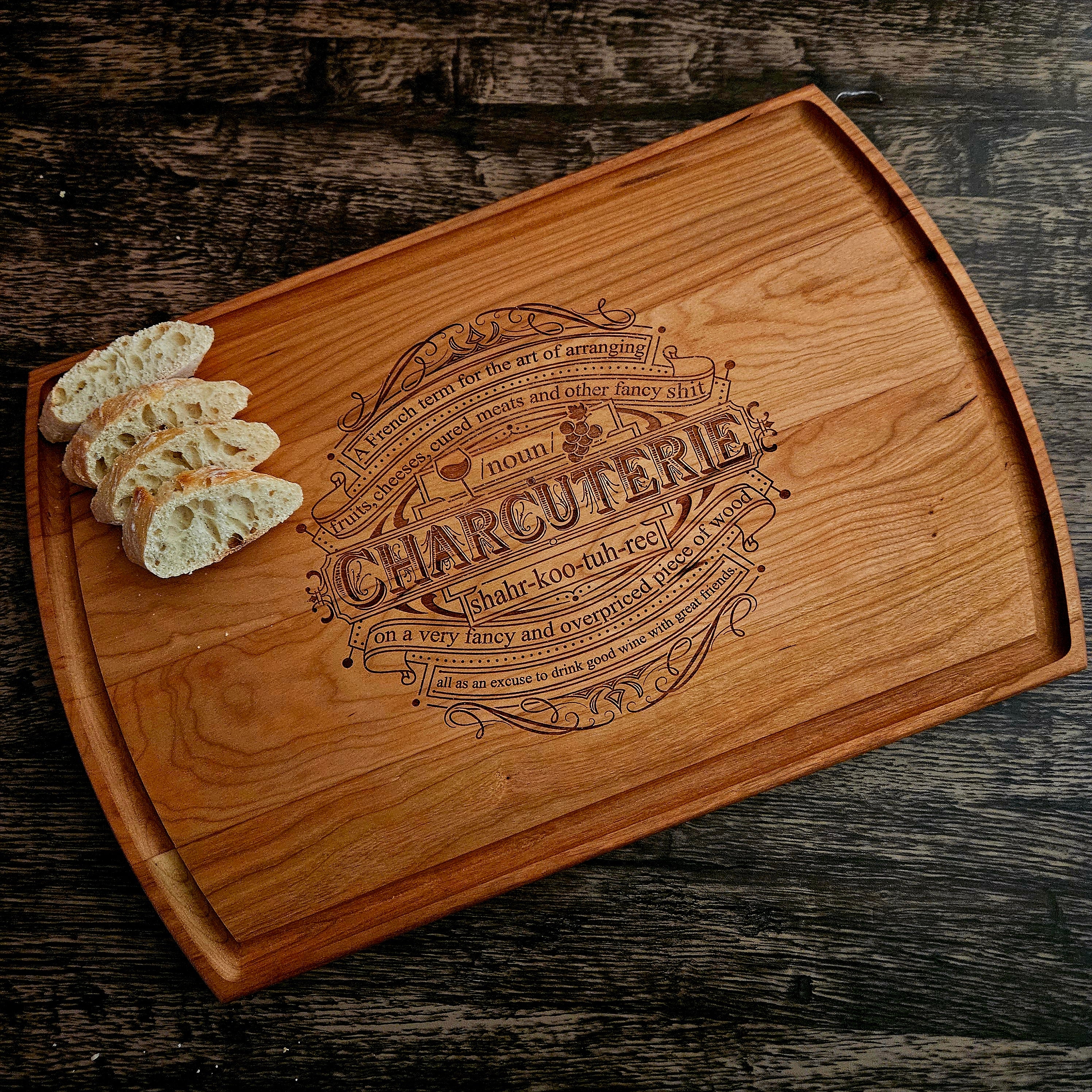 Premium cherry wood cutting board with rich warm tones, great for cutting, serving, and display.