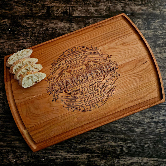 Premium cherry wood cutting board with rich warm tones, great for cutting, serving, and display.