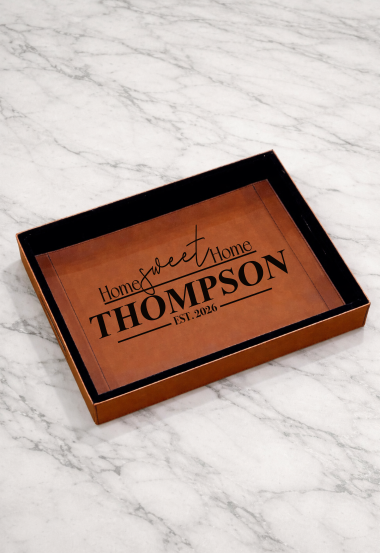 ​Noir Designed custom laser engraved cognac vegan leather valet tray with "Home Sweet Home" family name and established date.